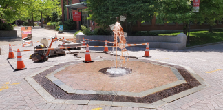 Freeman Plaza fountain spewing coffee during construction